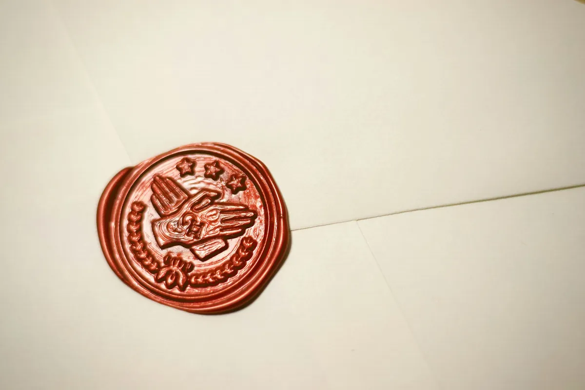 A round stamp resting on paper